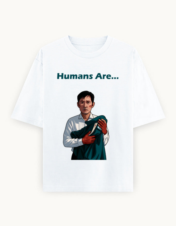 White oversized Squid Game t-shirt with Gi-hun(456) holding baby(222) and text “Humans Are…” – Korean drama fan streetwear from Skullmask.