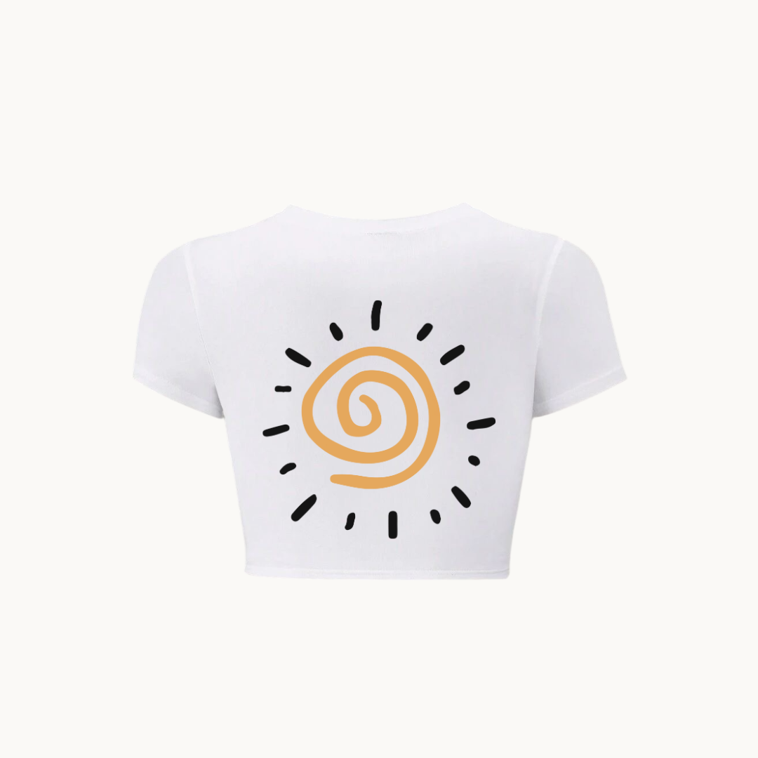 A WHITE cropped T-shirt with the phrase "YES, SUNSHINE?" printed in bold text on the front. The word "YES," is in white, and "SUNSHINE?" is in a warm yellow-orange color-SKULLMASK