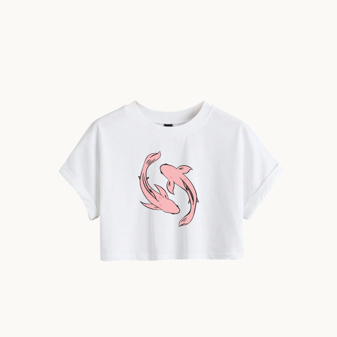 White cropped t-shirt with a minimalist design featuring two pink koi fish swimming in a circular pattern - SKULLMASK.